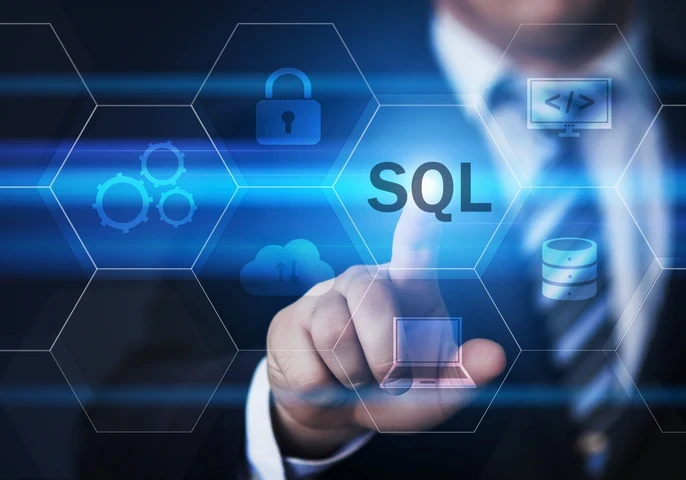 Business man tapping an SQL button on a virtual screen