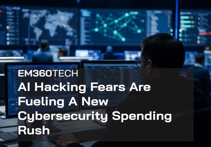 A cybersecurity operations centre with analysts working at computer monitors displaying code, network maps and security dashboards. A dark overlay reads: “EM360TECH AI Hacking Fears Are Fueling A New Cybersecurity Spending Rush.”