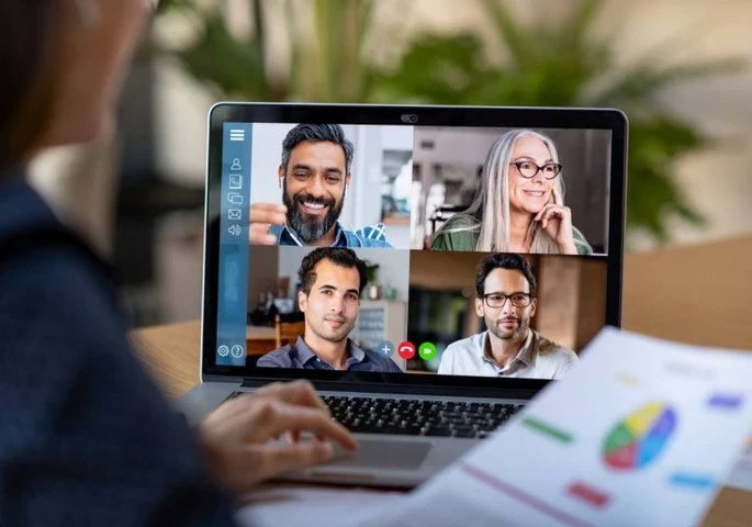 Someone on a video conference with four other people
