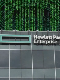 hpe is investigating a cybersecurity breach after a hacker claimed data theft. Photo depicts HPE office with a backdrop of numbers going in circles to indicate cyber threat