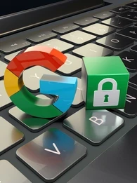 Google logo on a keyboard with a lock block next to it