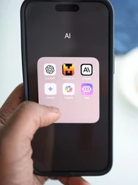https://unsplash.com/photos/a-person-holding-a-cell-phone-in-their-hand-hWSNT_Pp4x4?utm_content=creditShareLink&utm_medium=referral&utm_source=unsplash