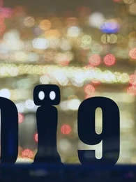 The year 2019 shown in front of a glowing cityscape with the 1 being represented by a robot
