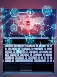 A red skull and cross bones on a laptop screen.