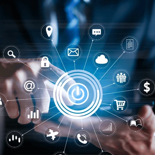 A businessman holding a tablet surrounded by various business-related logos/icons