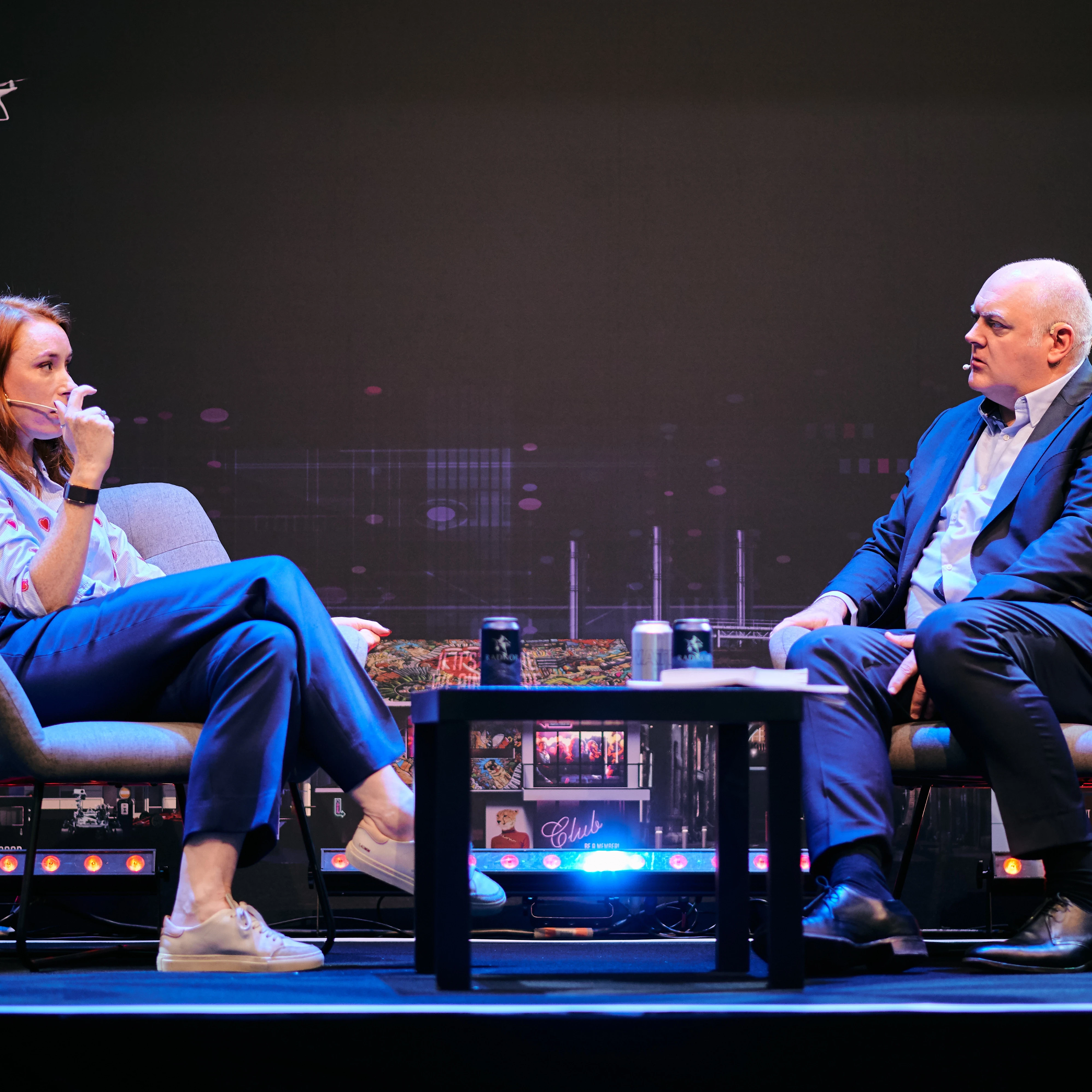 Dara O Briain and Hannah Fry having a discussion on stage at DTX + UCX Europe 2023