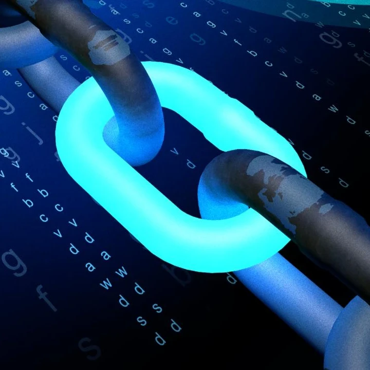 Image depicting blockchain technology with a glowing blue chain link and coding in the background.