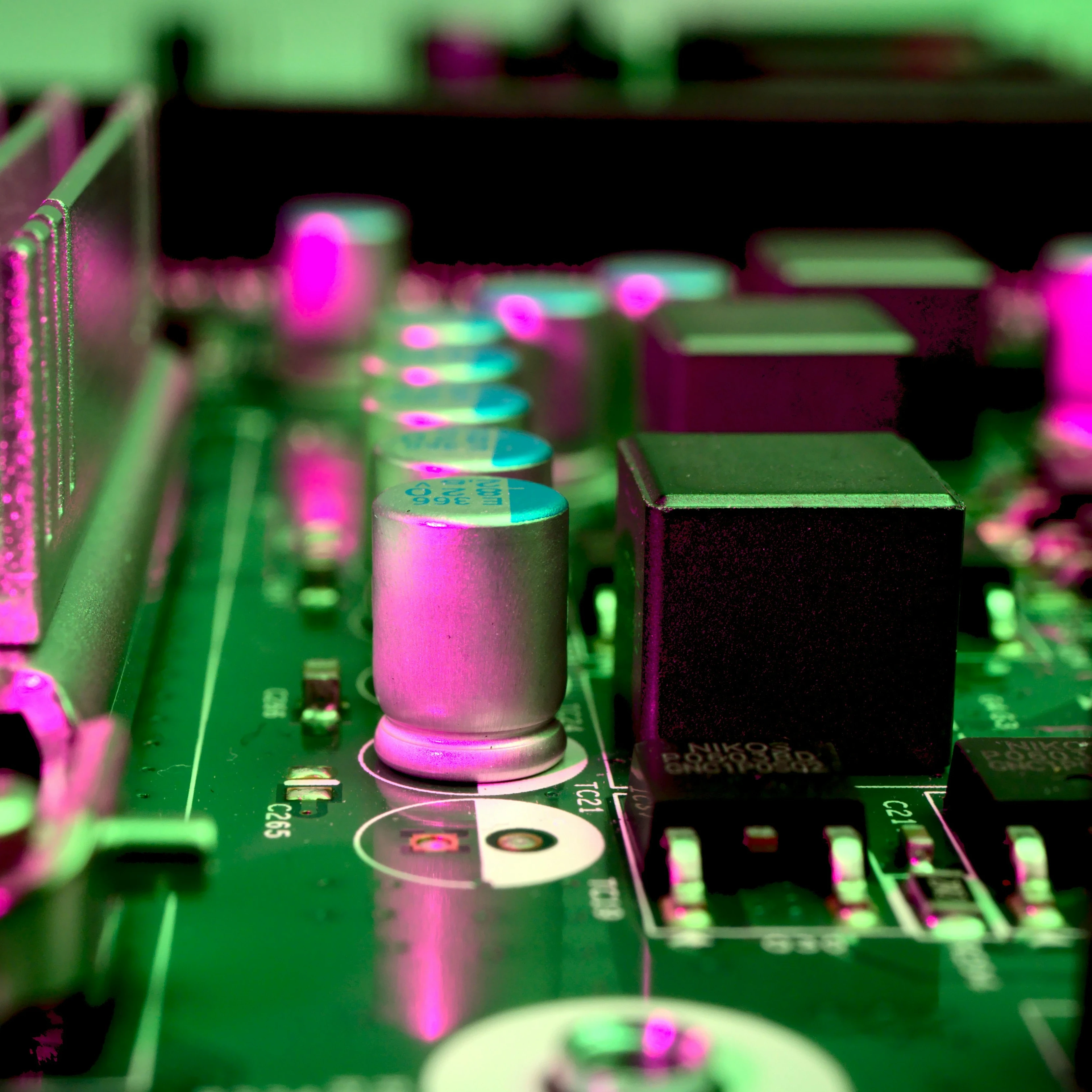 https://unsplash.com/photos/a-close-up-of-a-computer-motherboard-with-pink-lights-fX4lA-CIAwk?utm_content=creditShareLink&utm_medium=referral&utm_source=unsplash